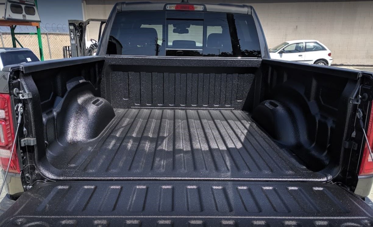 Truck with professionally installed bedliner and accessories at Hidden City Upfitters